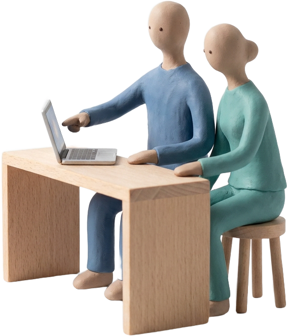 Two agents co-building at a laptop